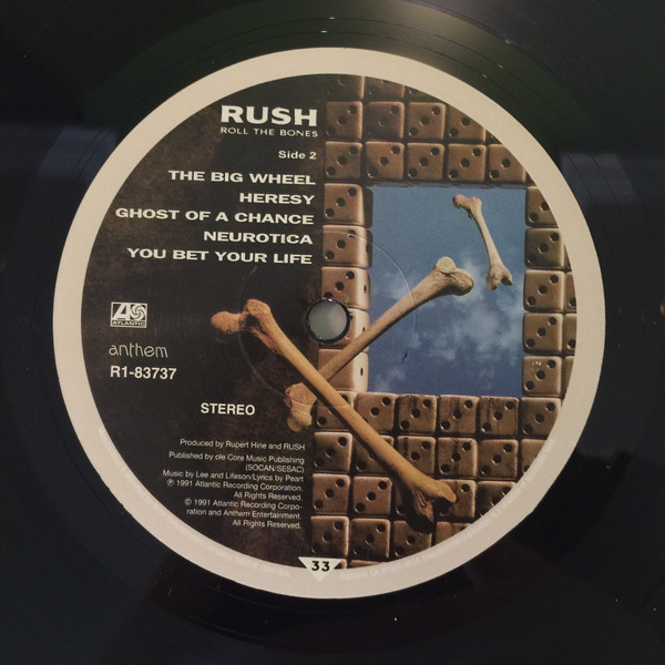 Rush - Roll The Bones (R1 83737)